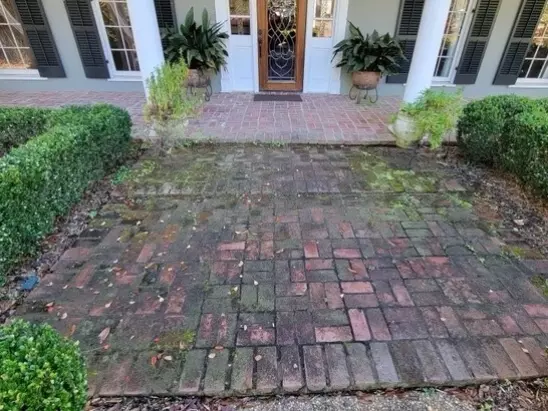 image of a brick walkway before a professional washing by A-1 Window Washers