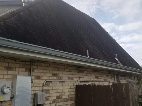 image of brick home and roof after a professional washing by A-1 Window Washers